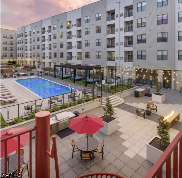 100 Union Street, Unit 429 Elizabeth, NJ 07202 - Photo 5 of 41 a building outdoor space with patio furniture