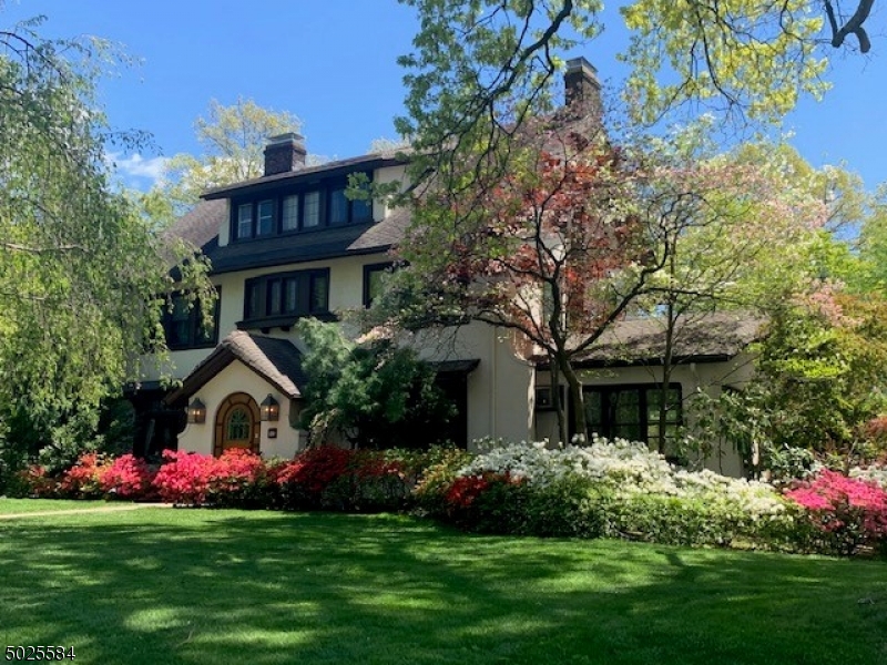 89 Ridgewood Avenue Glen Ridge, NJ 07028 - Photo 21 of 21 a front view of house with yard and green space