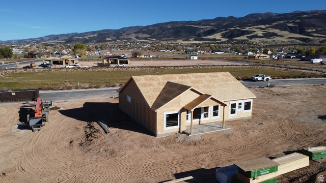 4973 North 900 East Enoch, UT 84721 - Photo 5 of 8 Drone / aerial view of a mountainous background