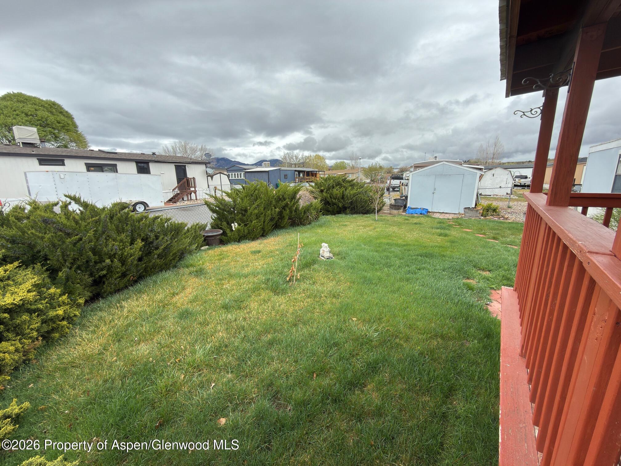 200 West 20th Street, Unit B17 Rifle, CO 81650 - Photo 12 of 12 a view of a big yard with potted plants