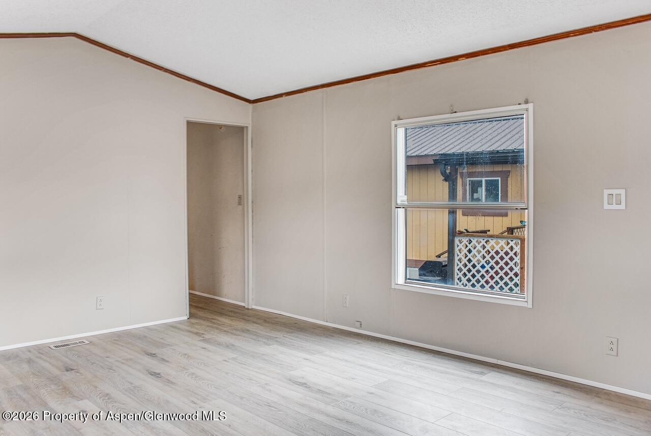 200 West 20th Street, Unit B17 Rifle, CO 81650 - Photo 2 of 12 a view of an empty room with windows