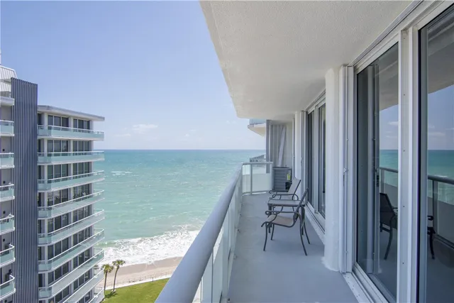 a view of a living room and dining room