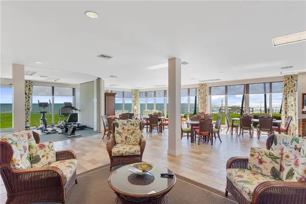 a view of a livingroom with furniture window and outside view