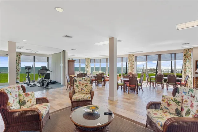 a view of a livingroom with furniture window and outside view