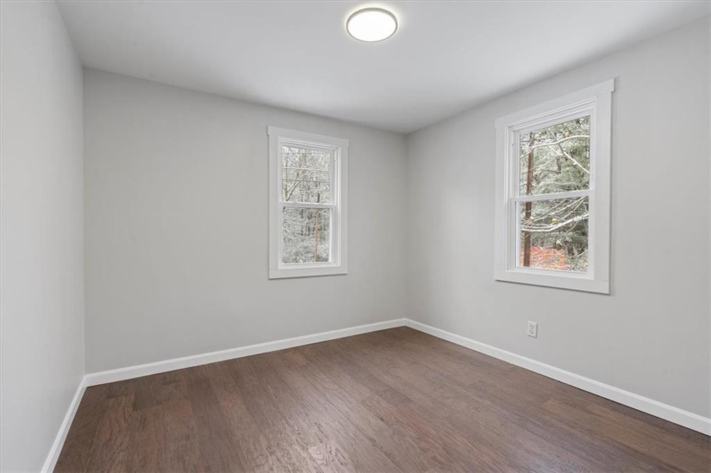 111 Becker Road Butler, PA 16002 - Photo 12 of 25 wooden floor in an empty room with a window