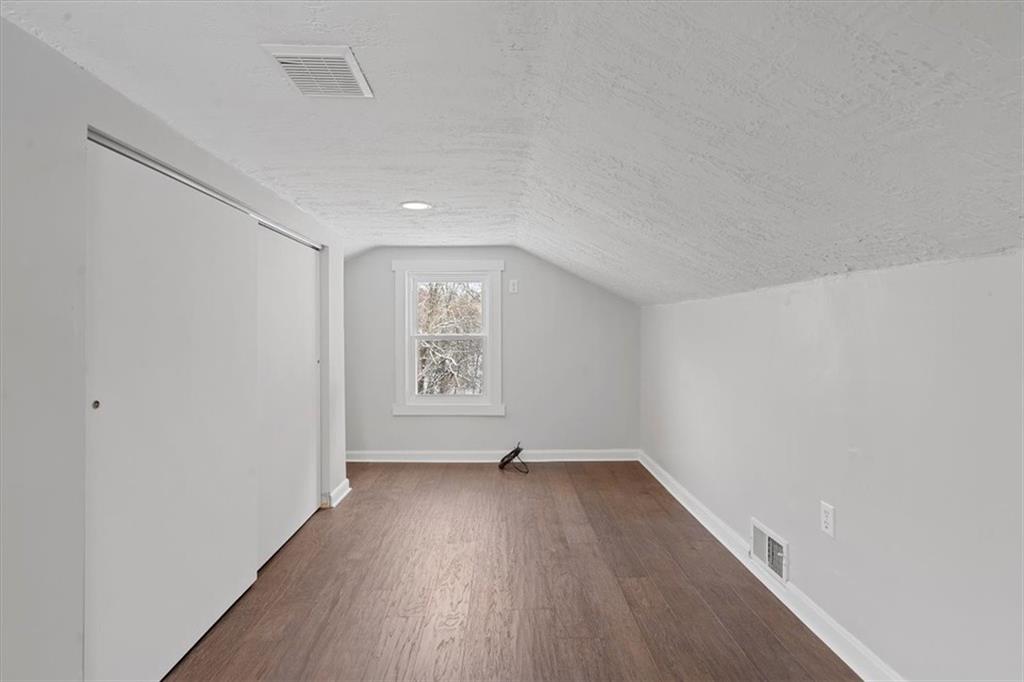 111 Becker Road Butler, PA 16002 - Photo 17 of 25 a view of empty room with wooden floor and fan