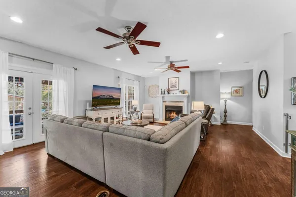 a living room with furniture a fireplace