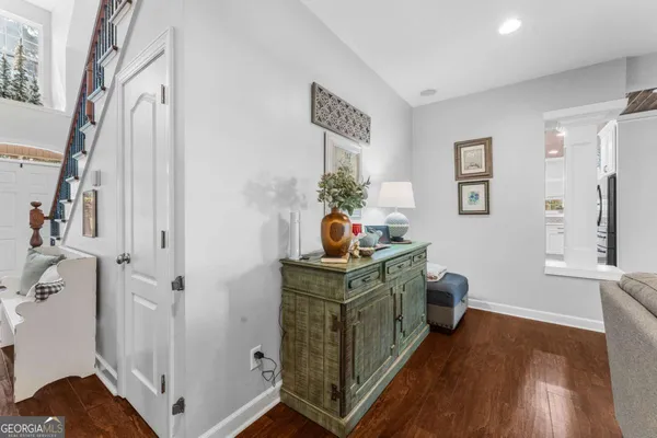 a kitchen that has a lot of cabinets in it and appliances
