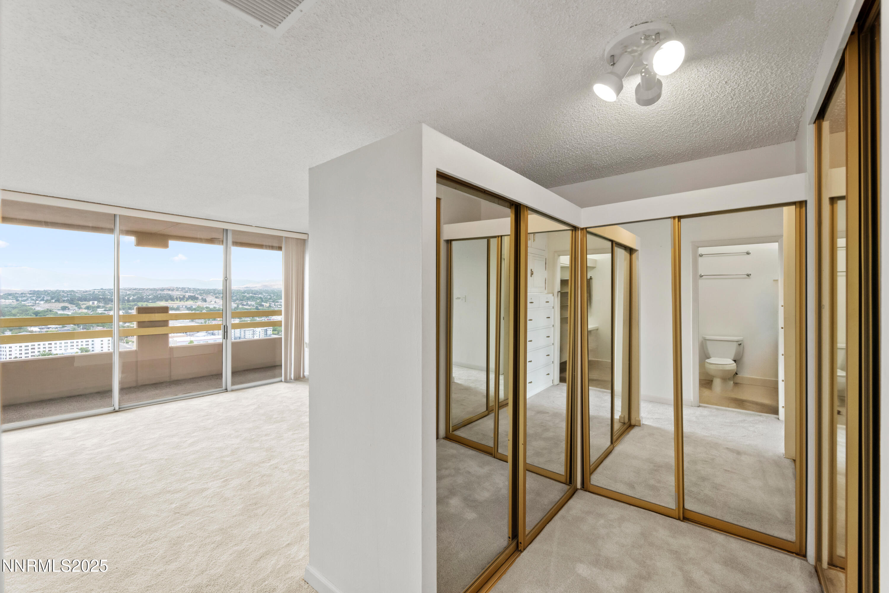 100 North Arlington Avenue, Unit 23P Reno, NV 89501 - Photo 14 of 31 a view of an empty room and window