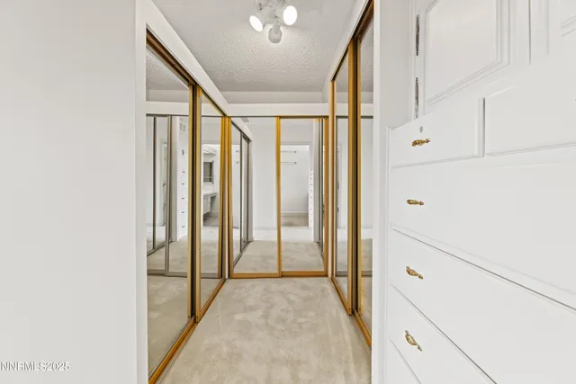 wooden floor and an empty room with a window