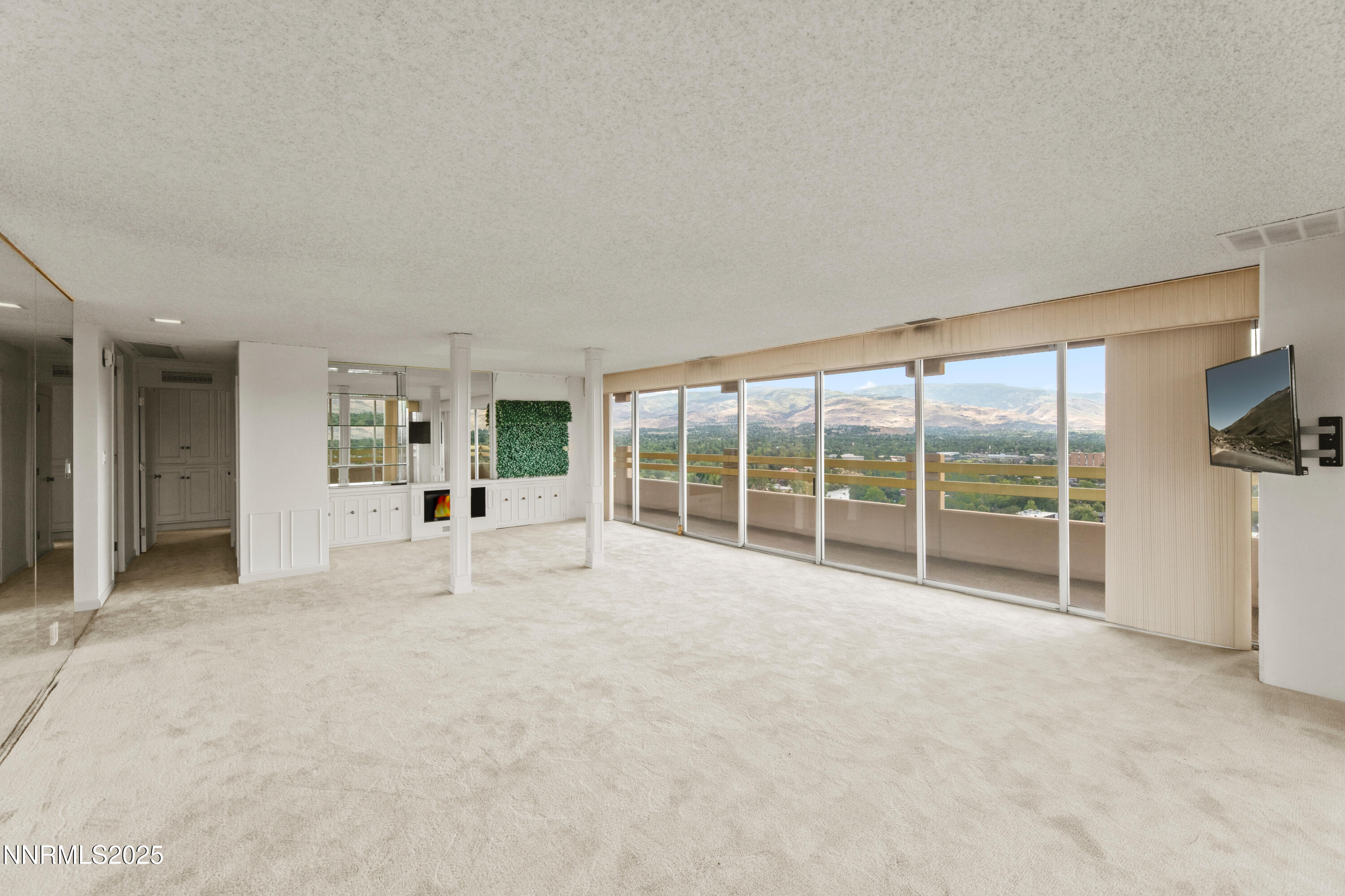 100 North Arlington Avenue, Unit 23P Reno, NV 89501 - Photo 5 of 31 a view of an empty room with a window