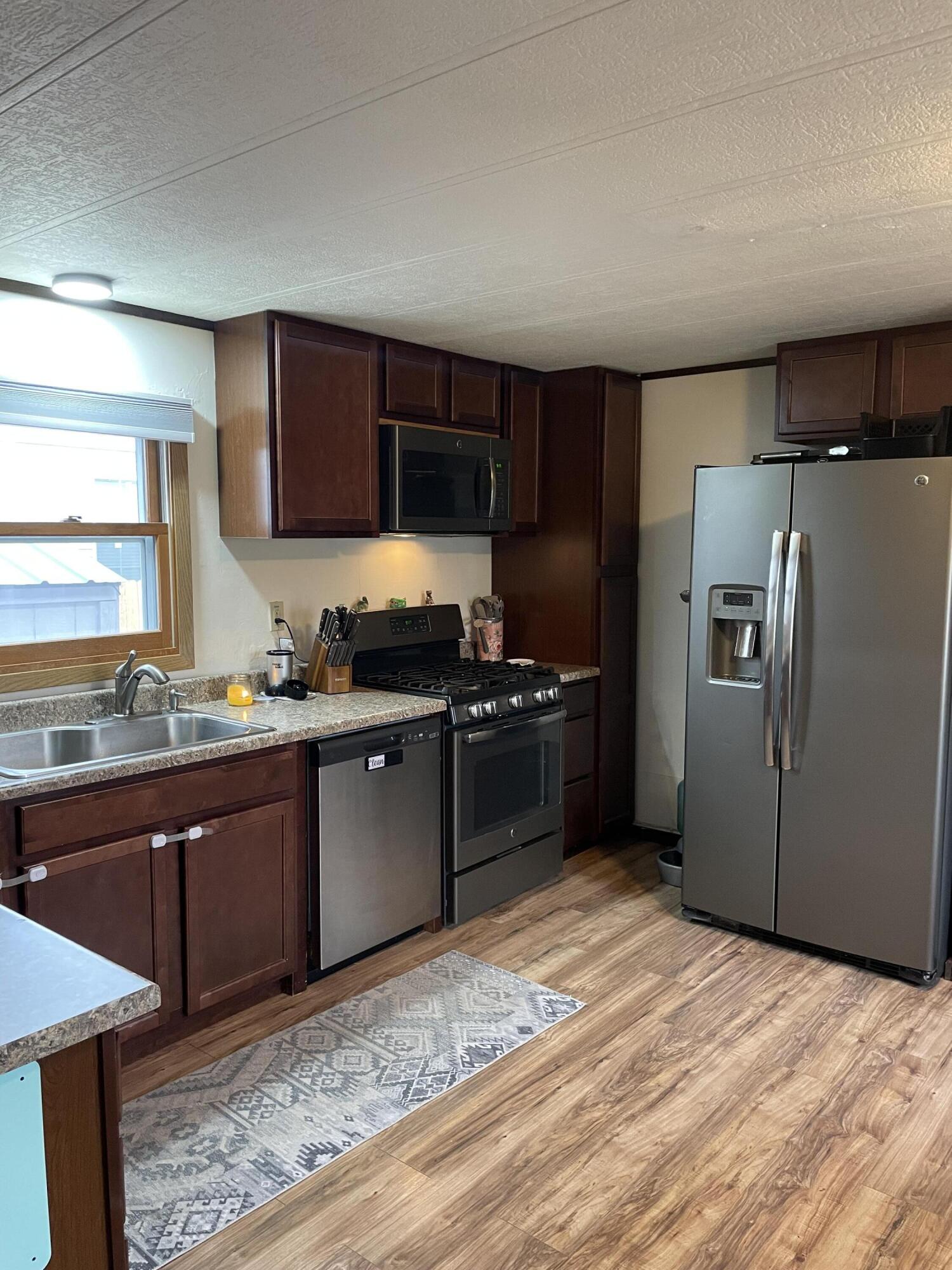 1511 Mydland Road, Unit 185 Sheridan, WY 82801 - Photo 4 of 18 IMG_9659