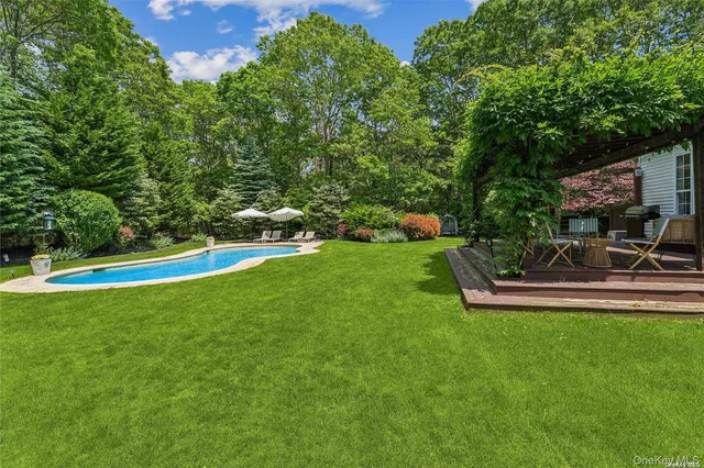 a large white kitchen with lots of counter top space