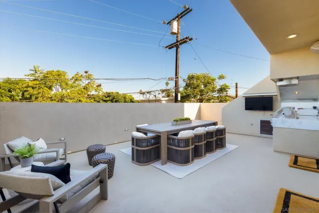 a view of a terrace with sitting area