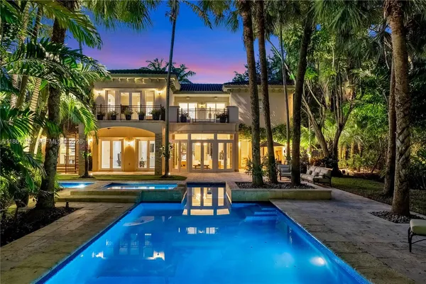 a view of a house with a swimming pool
