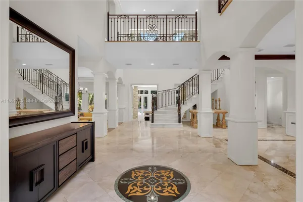 a view of an entryway with a fireplace