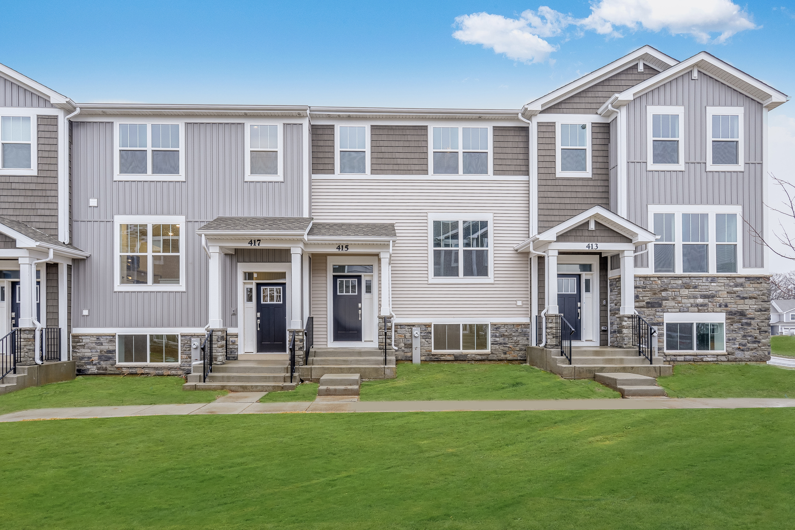 415 Red Oak Circle Volo, IL 60020 - Photo 1 of 14 a front view of a house with a yard