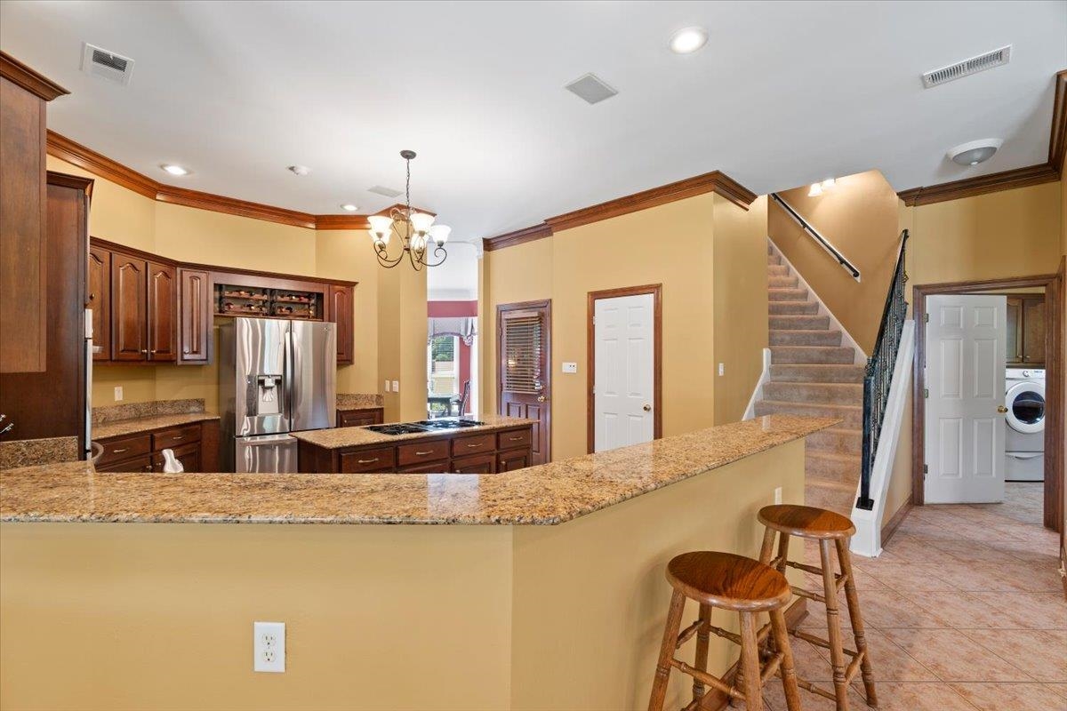 1226 Oak Lake Circle Collierville, TN 38017 - Photo 14 of 39 a view of a livingroom with furniture and window