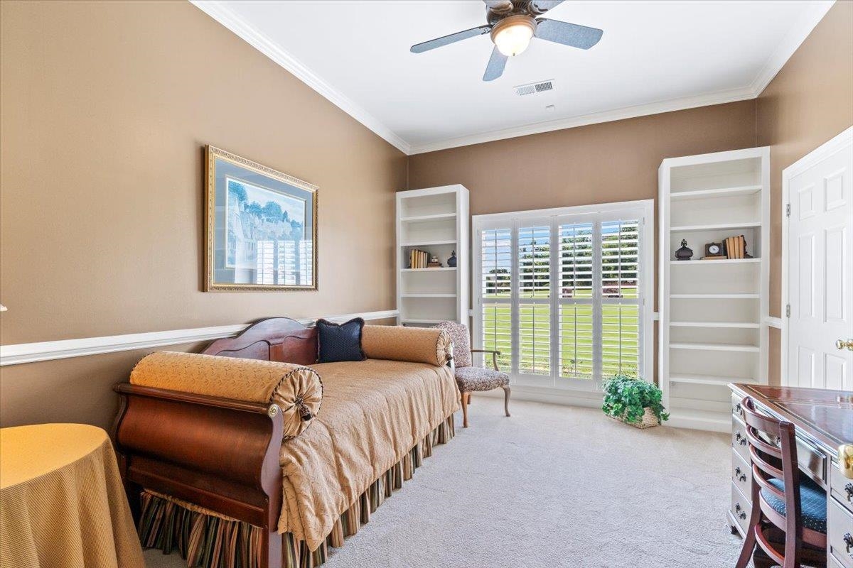 1226 Oak Lake Circle Collierville, TN 38017 - Photo 24 of 39 a bedroom with furniture and a large window