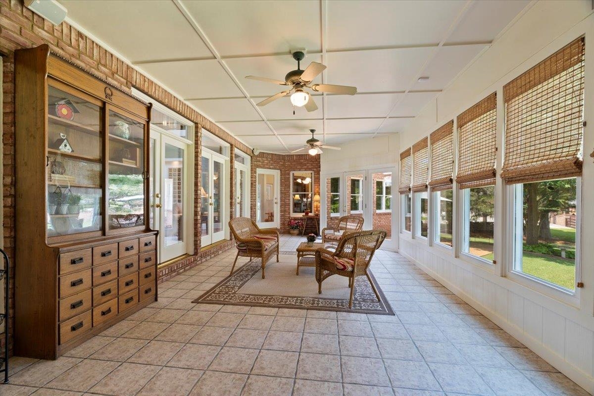 1226 Oak Lake Circle Collierville, TN 38017 - Photo 27 of 39 a outdoor space with lots of white furniture and a chandelier