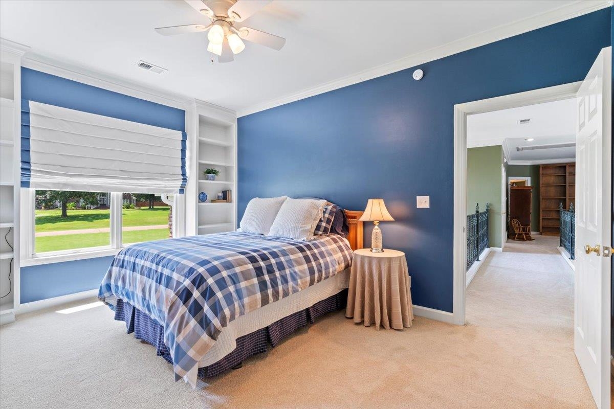 1226 Oak Lake Circle Collierville, TN 38017 - Photo 29 of 39 a bedroom with a bed and a large window