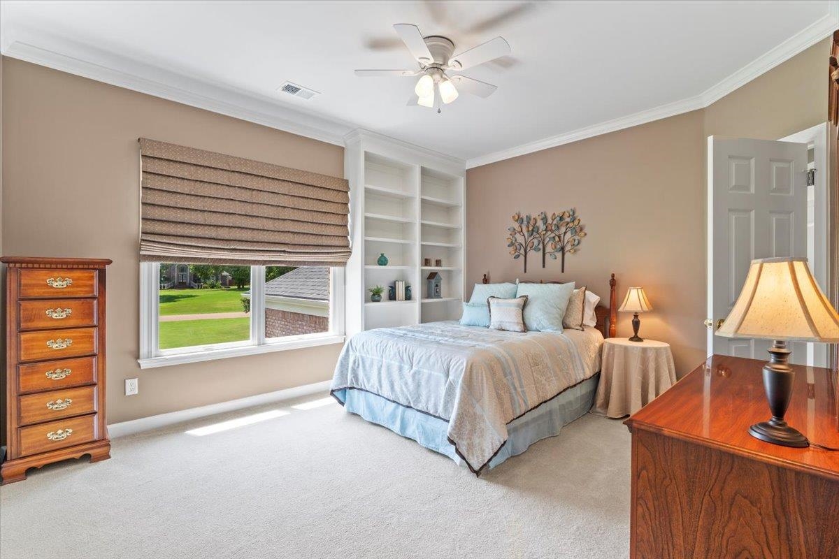 1226 Oak Lake Circle Collierville, TN 38017 - Photo 33 of 39 a bed room with a bed and a television