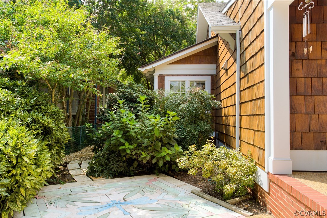 5015 Caledonia Road Richmond, VA 23225 - Photo 27 of 29 Patio and flower garden. You cannot see the gate t