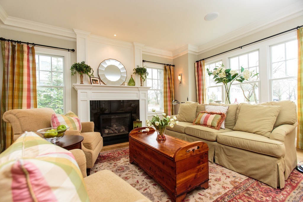 23 Wingate Road Wellesley, MA 02481 - Photo 3 of 23 a living room with furniture a large window and a fireplace