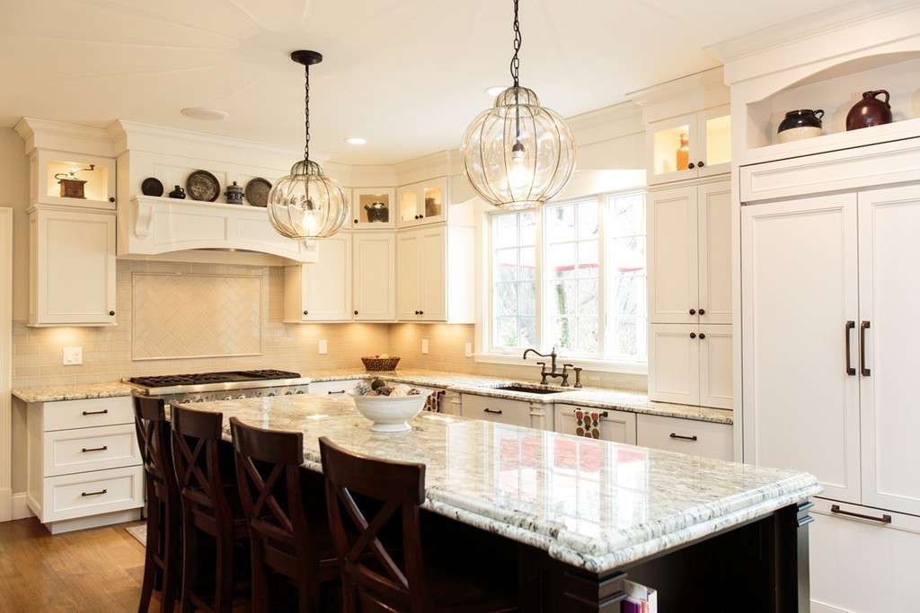 23 Wingate Road Wellesley, MA 02481 - Photo 5 of 23 a kitchen with a table chairs and white cabinets