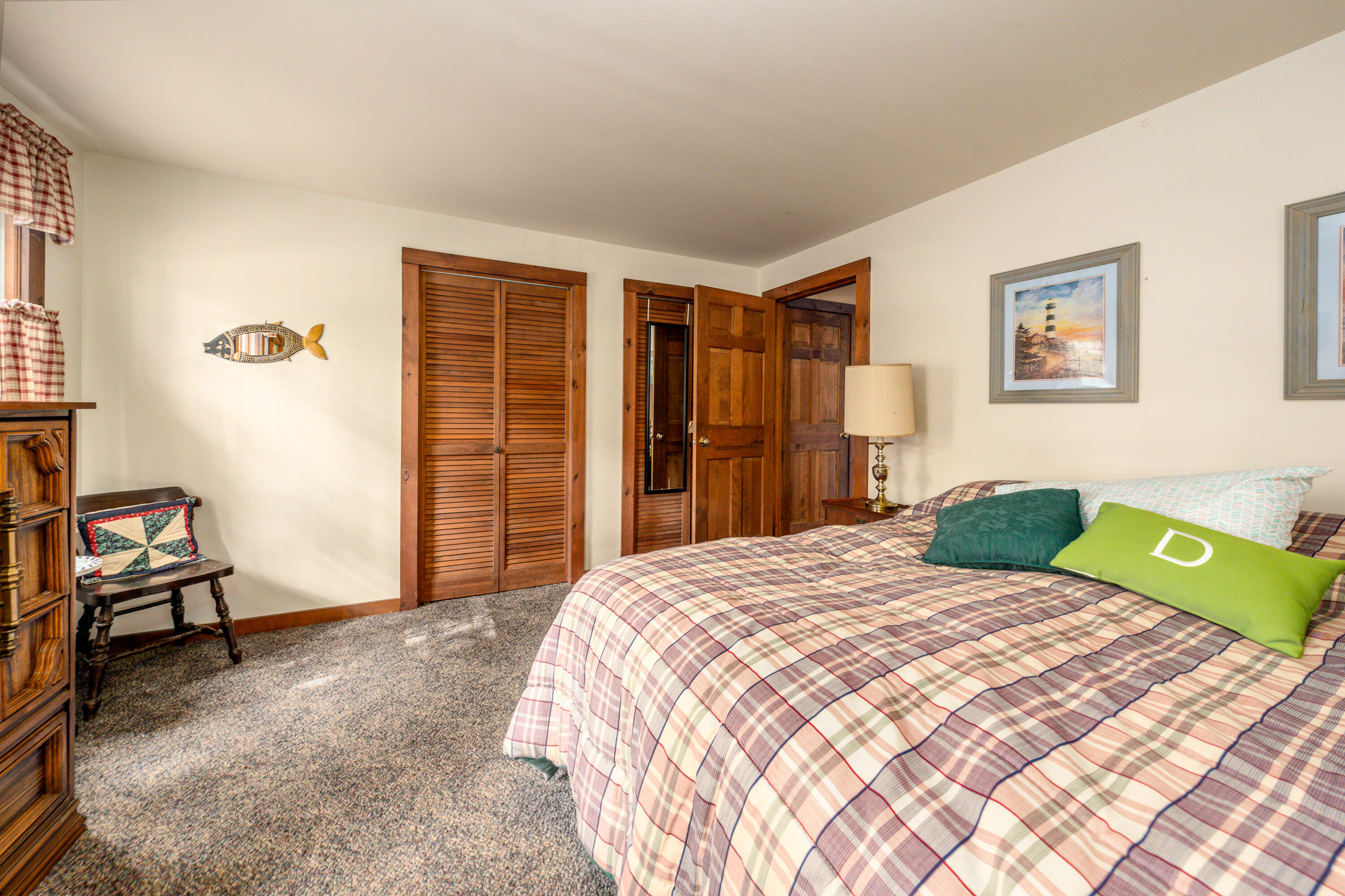 295 Long Pond Road Wellfleet, MA 02667 - Photo 13 of 33 a bedroom with a bed and a window