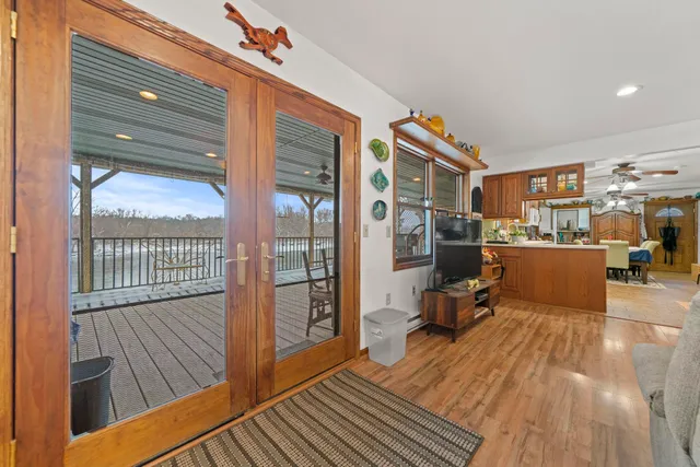 a view of a livingroom with furniture and wooden floor