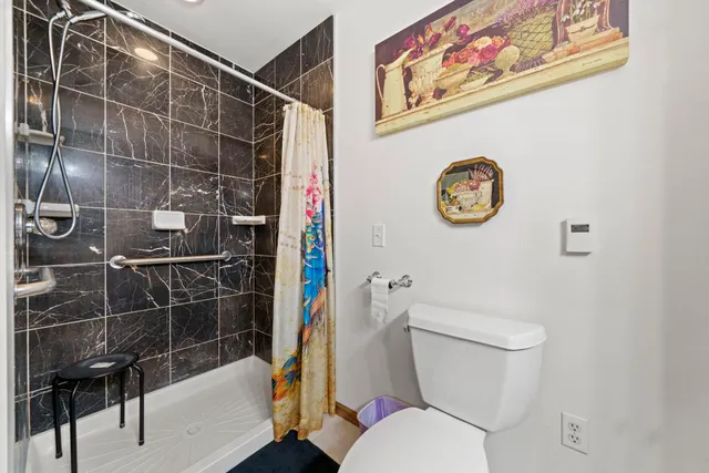 a bathroom with a sink and toilet