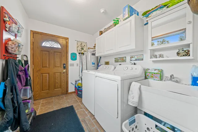 a white toilet sitting next to a shower