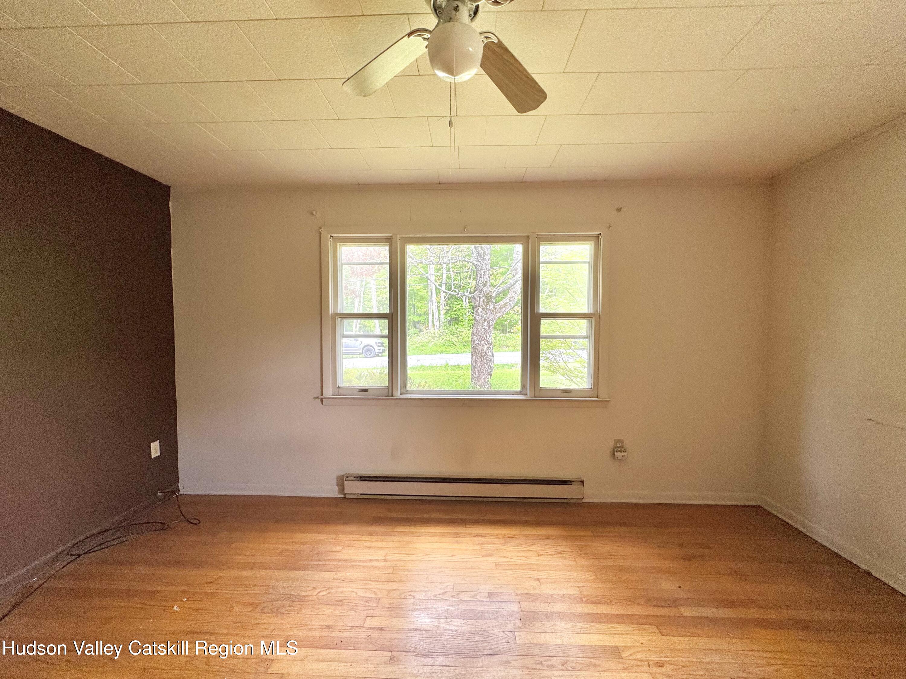 752 Old Rte 23 Acra, NY 12405 - Photo 15 of 25 a view of an empty room with a window