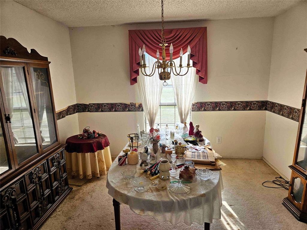 503 Pin Oak Drive Terrell, TX 75161 - Photo 7 of 23 a view of a dining room with furniture and window