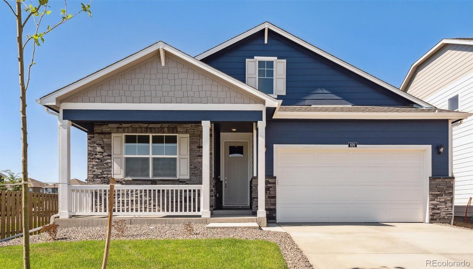 a front view of a house with a garage