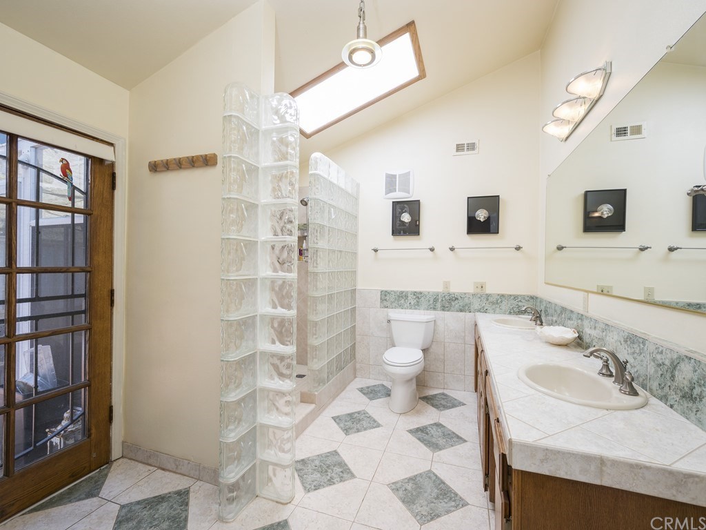 2630 Maple Avenue Morro Bay, CA 93442 - Photo 28 of 49 a bathroom with a sink toilet and shower
