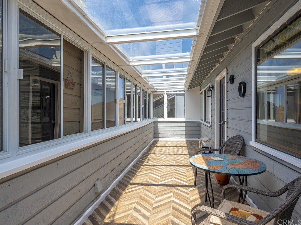 2630 Maple Avenue Morro Bay, CA 93442 - Photo 31 of 49 a view of a balcony with chairs and a table