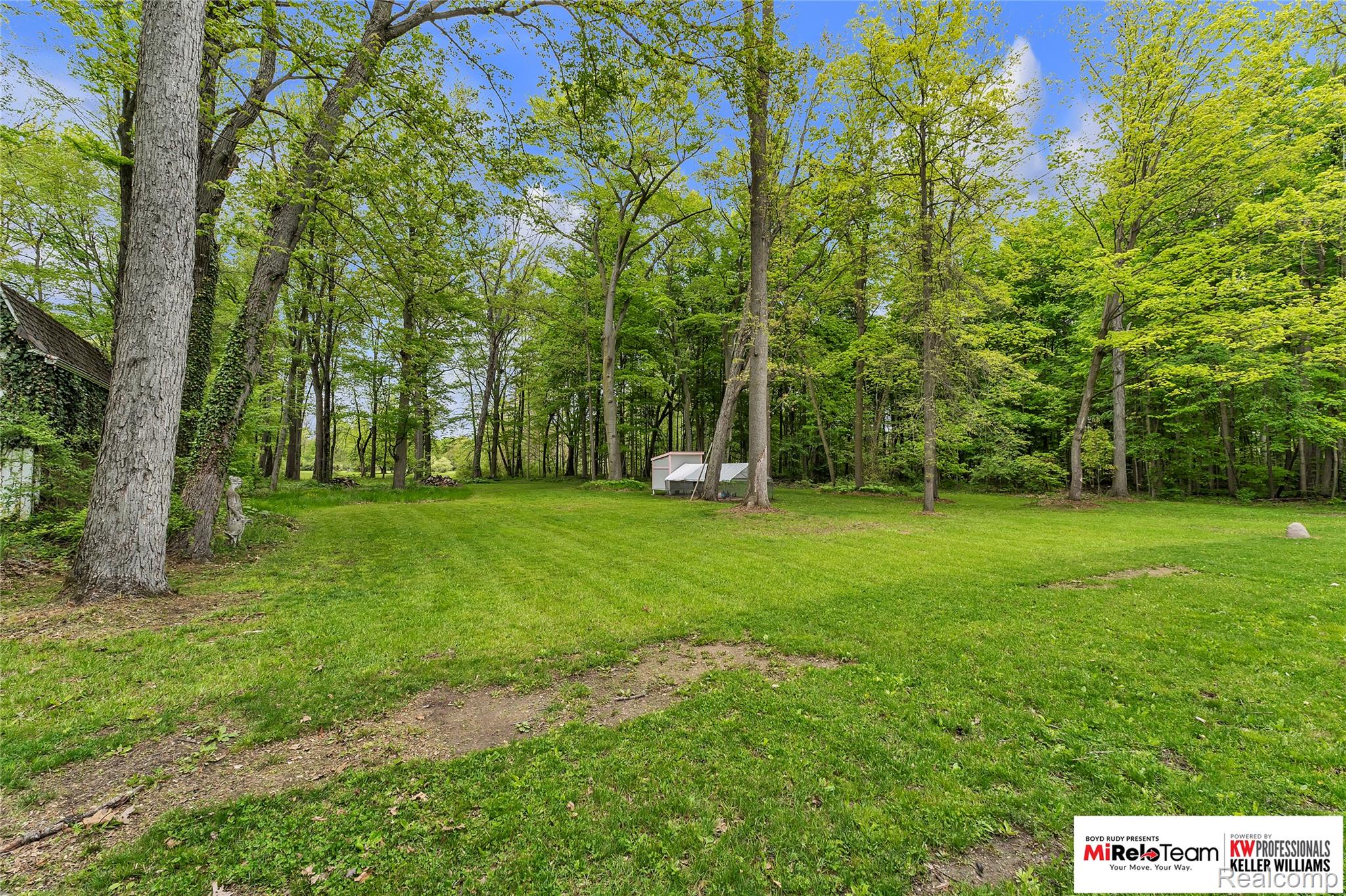 10191 Judd Road Willis, MI 48191 - Photo 31 of 39 View of grassy yard featuring an outbuilding