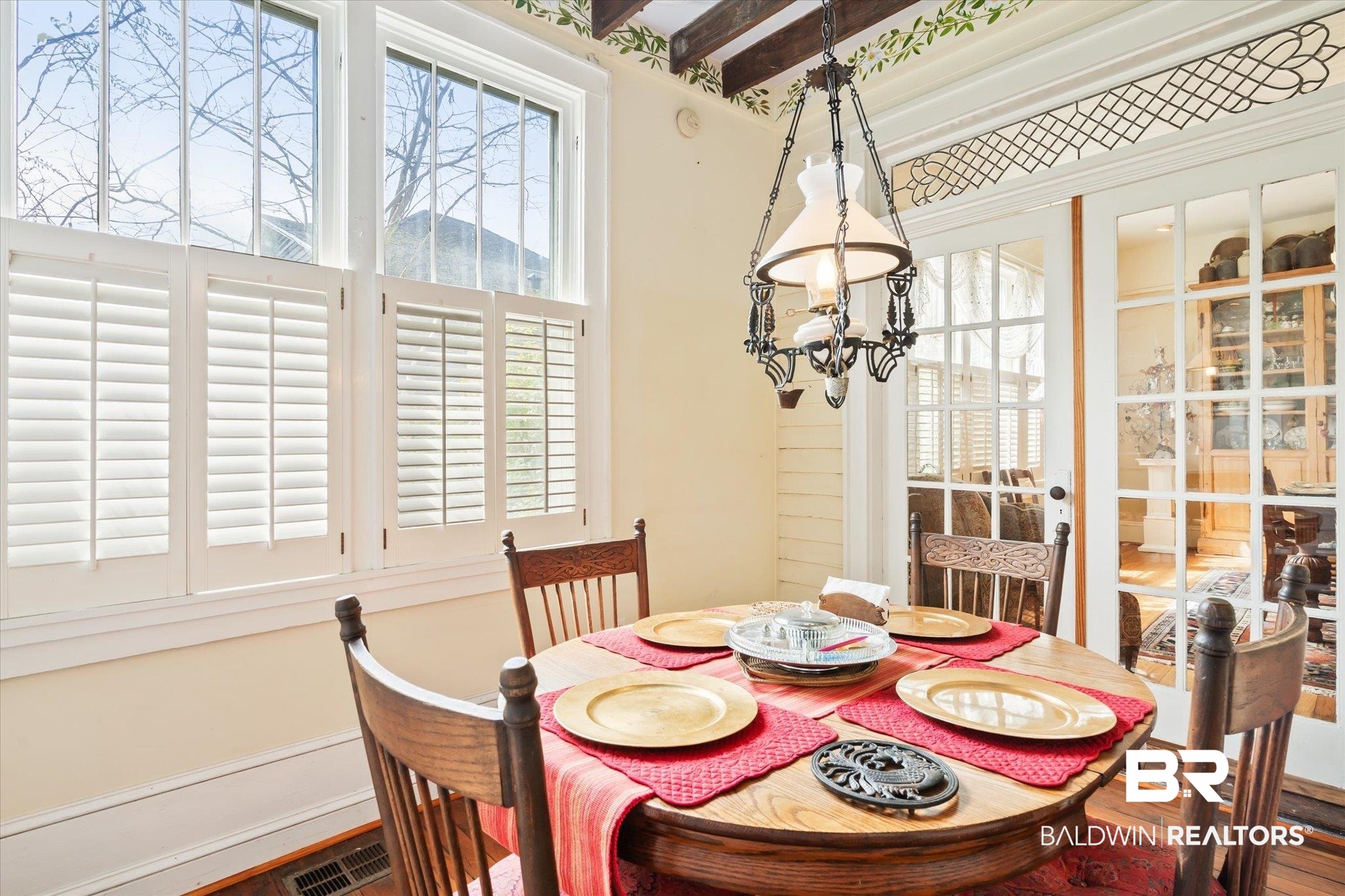 12 Lebaron Street Mobile, AL 36602 - Photo 11 of 37 Dining space featuring wood-type flooring and beam ceiling