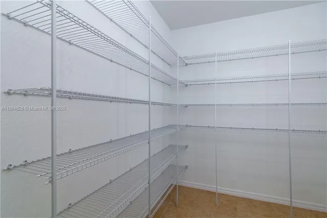 a view of a room with racks on the wall