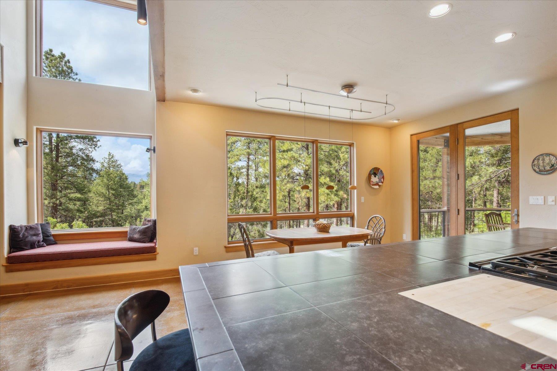 152 Peak Trail Drive Durango, CO 81303 - Photo 11 of 44 a lobby with furniture and floor to ceiling window