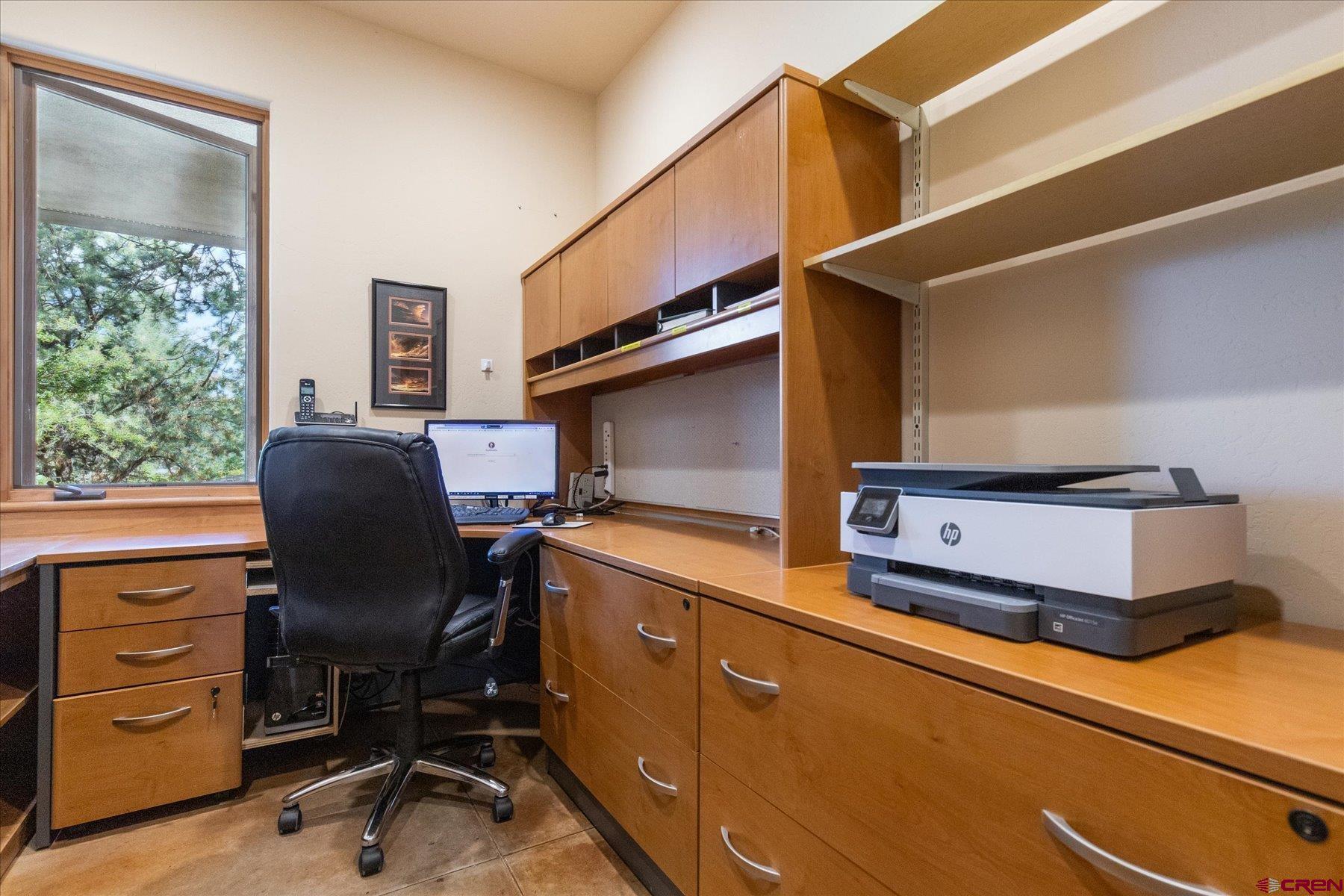 152 Peak Trail Drive Durango, CO 81303 - Photo 21 of 44 a workspace with furniture and a window