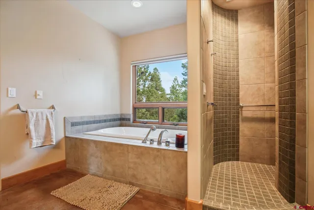 a bathroom with a sink a mirror and a shower curtain