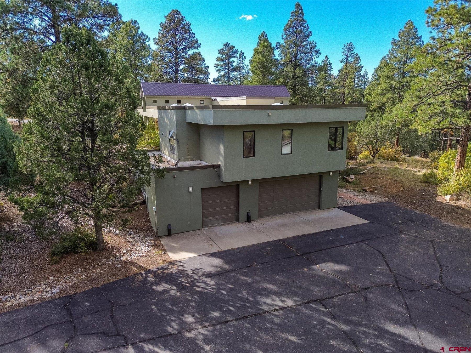 152 Peak Trail Drive Durango, CO 81303 - Photo 41 of 44 a view of a tiny house with a yard