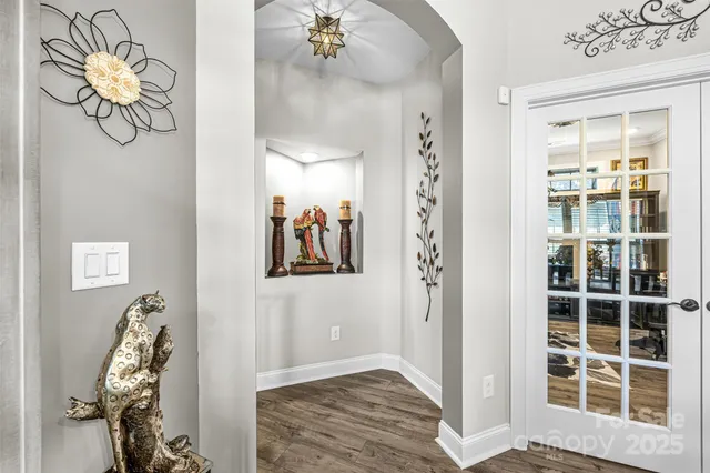 a view of a room with window and glass door