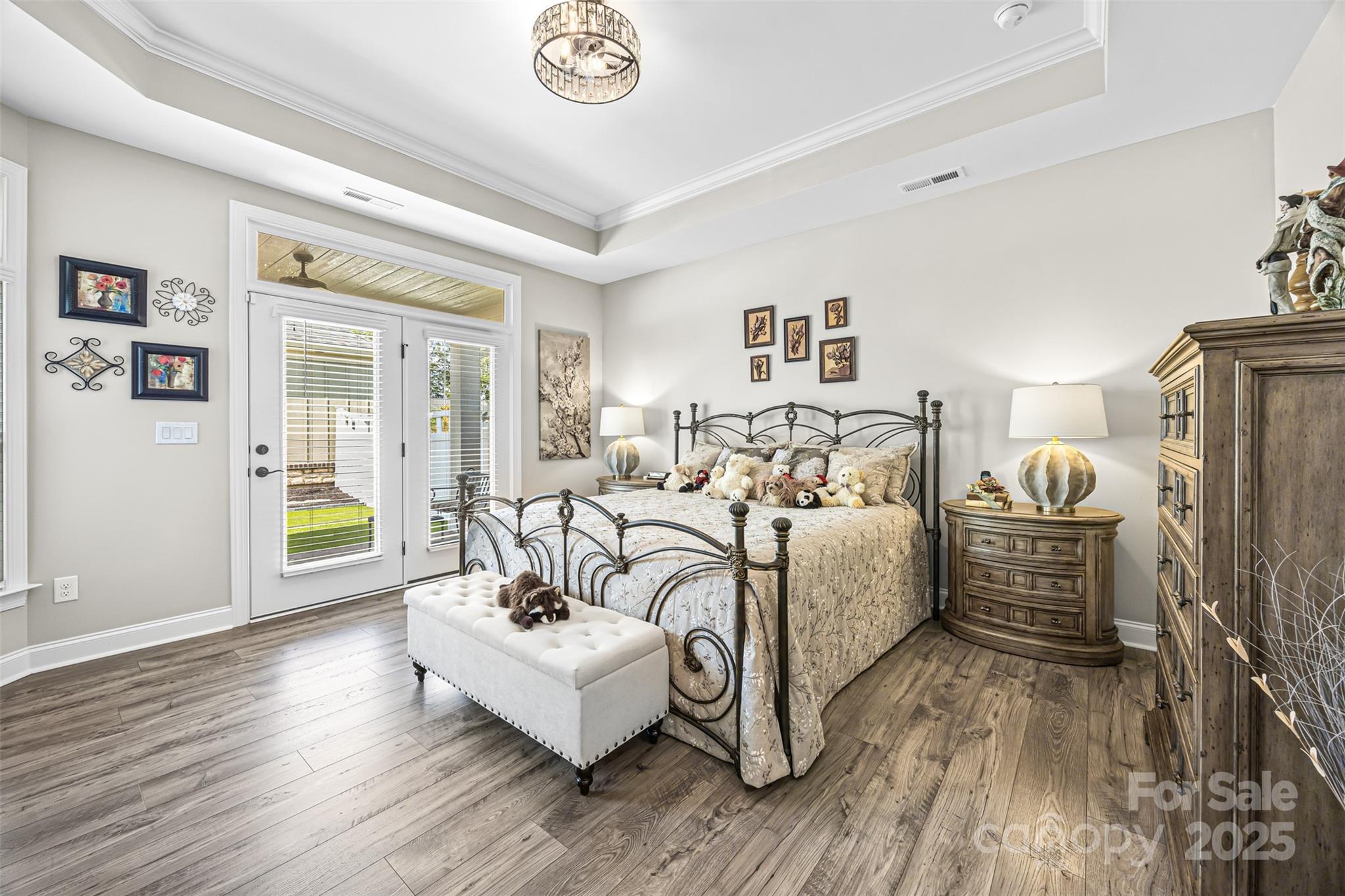 16020 Clear Creek Farm Road Matthews, NC 28105 - Photo 22 of 42 a bedroom with furniture and wooden floor