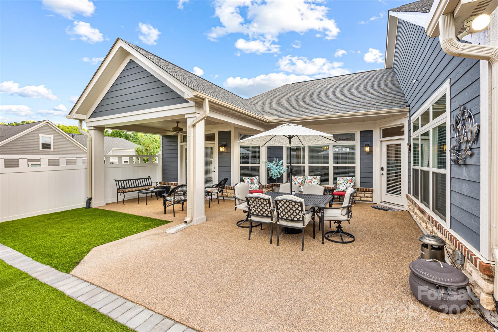 16020 Clear Creek Farm Road Matthews, NC 28105 - Photo 34 of 42 a house view with a sitting space and garden space
