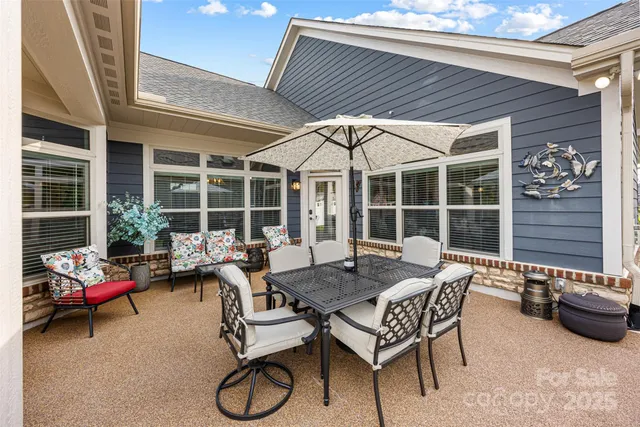 a outdoor space with patio the couches and a potted plant
