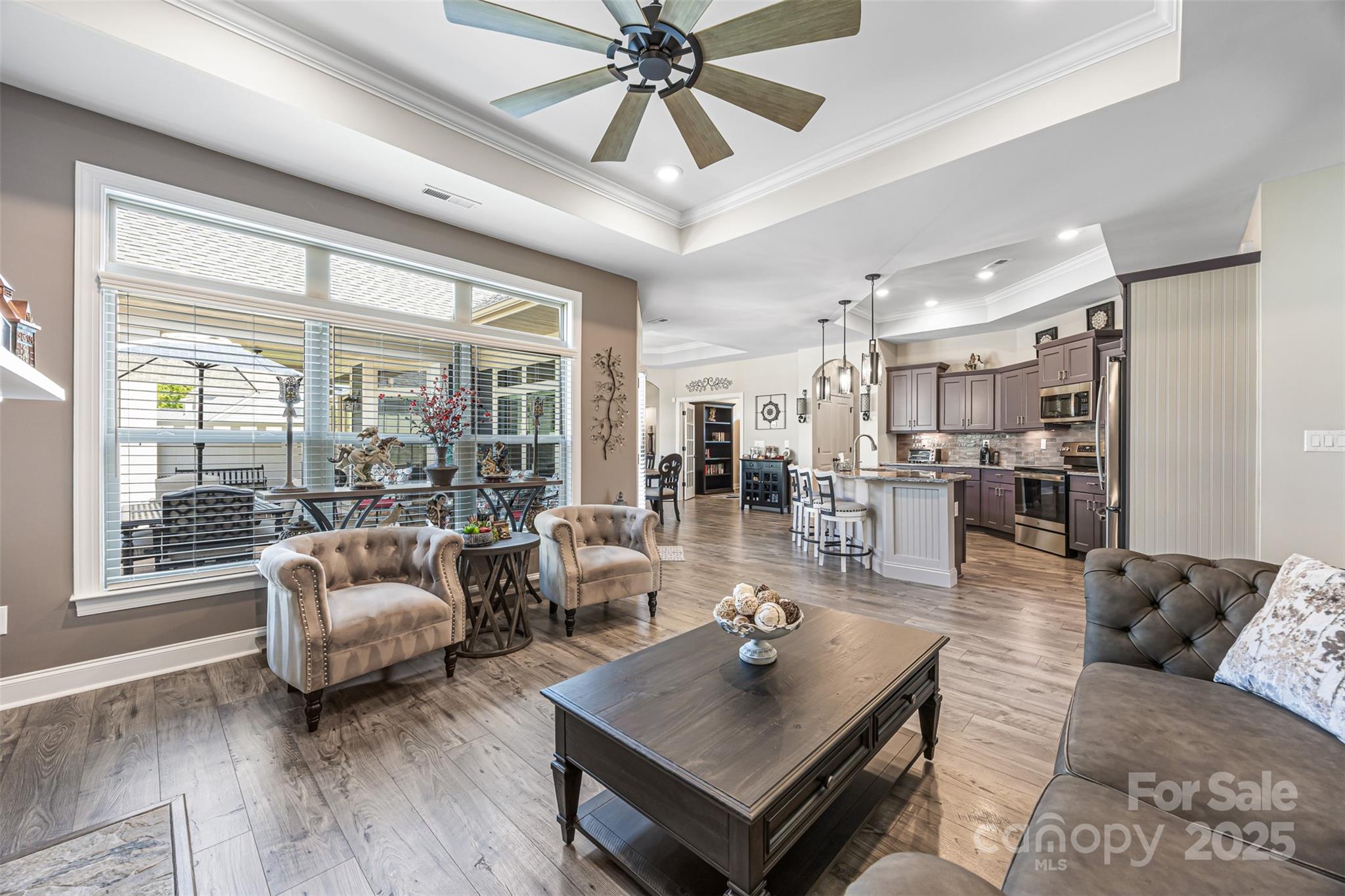 16020 Clear Creek Farm Road Matthews, NC 28105 - Photo 9 of 42 a living room with furniture and a large window